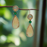 Round opal and emerald